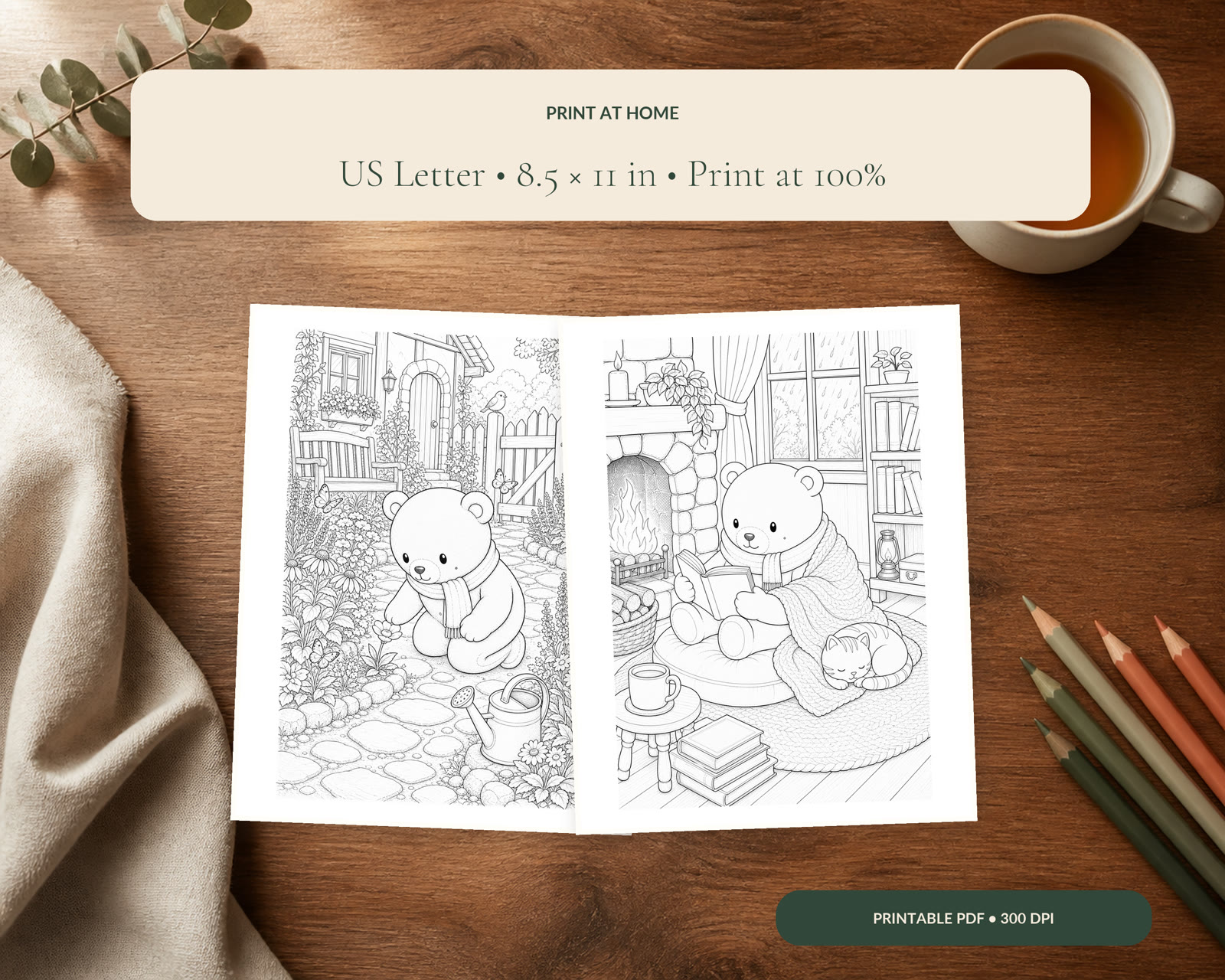 Two current Volume One pages printed at home beside tea and colored pencils
